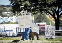 SA among top 10 financially stressed countries amid high unemployment Job seekers on the side of the road.