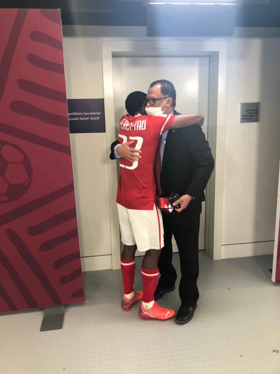 Danny Jordaan, the president of the South African Football Association with Percy Tau.