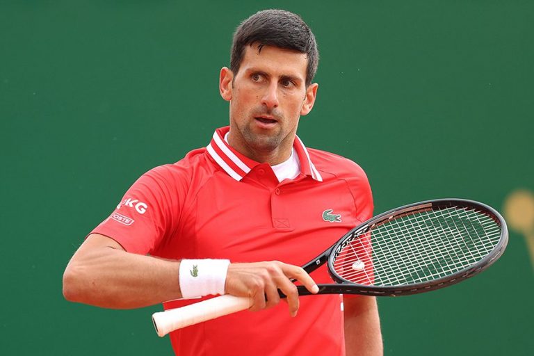 Defiant and unshaken, Djokovic stands his ground