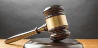Bank employee arrested