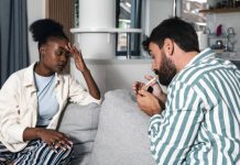 Couple smoking cigarettes