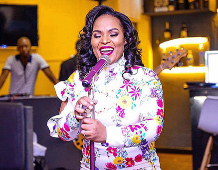 Singer Bucie moves out after husband files for divorce