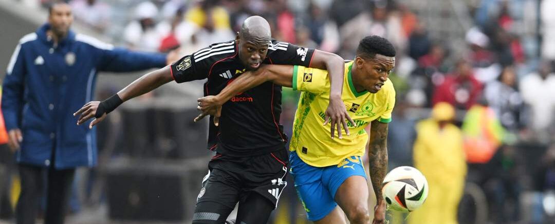 Mamelodi Sundowns and Orlando Pirates players tussling for the ball