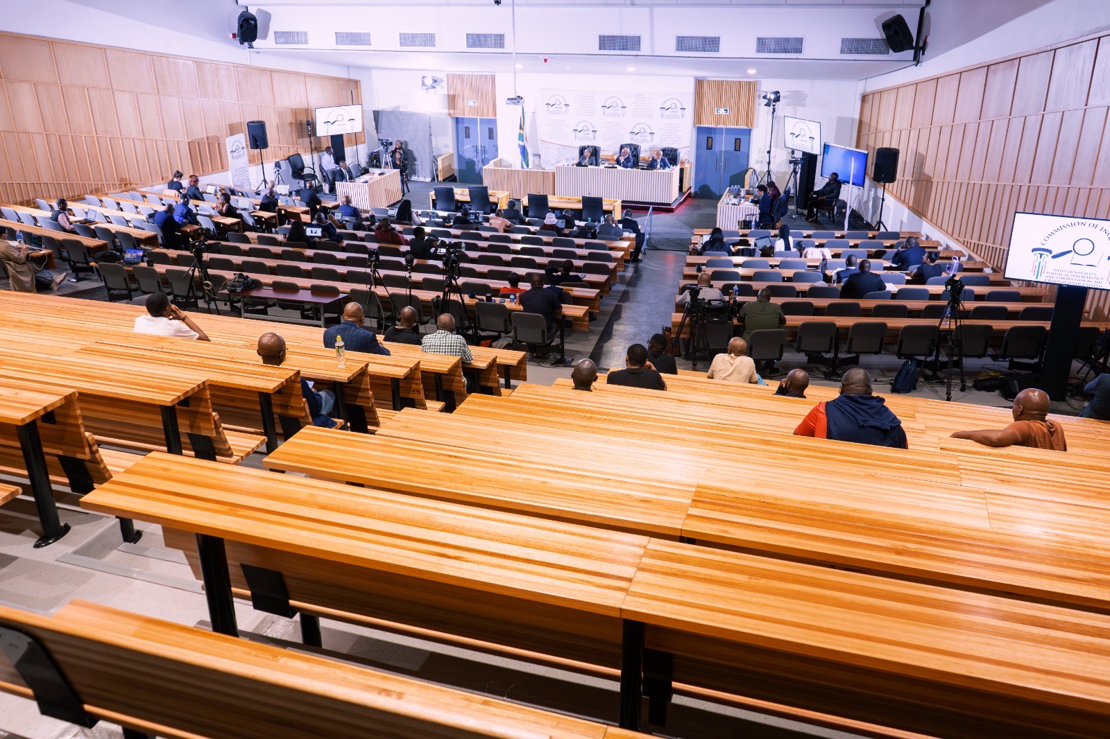 Inside Bridgette Mabandla Justice College in Pretoria, the commission hearings unfold. The public gallery sits mostly empty, prompting questions: is this a sign of limited civic interest, or are South Africans turning to online streams to follow the proceedings?