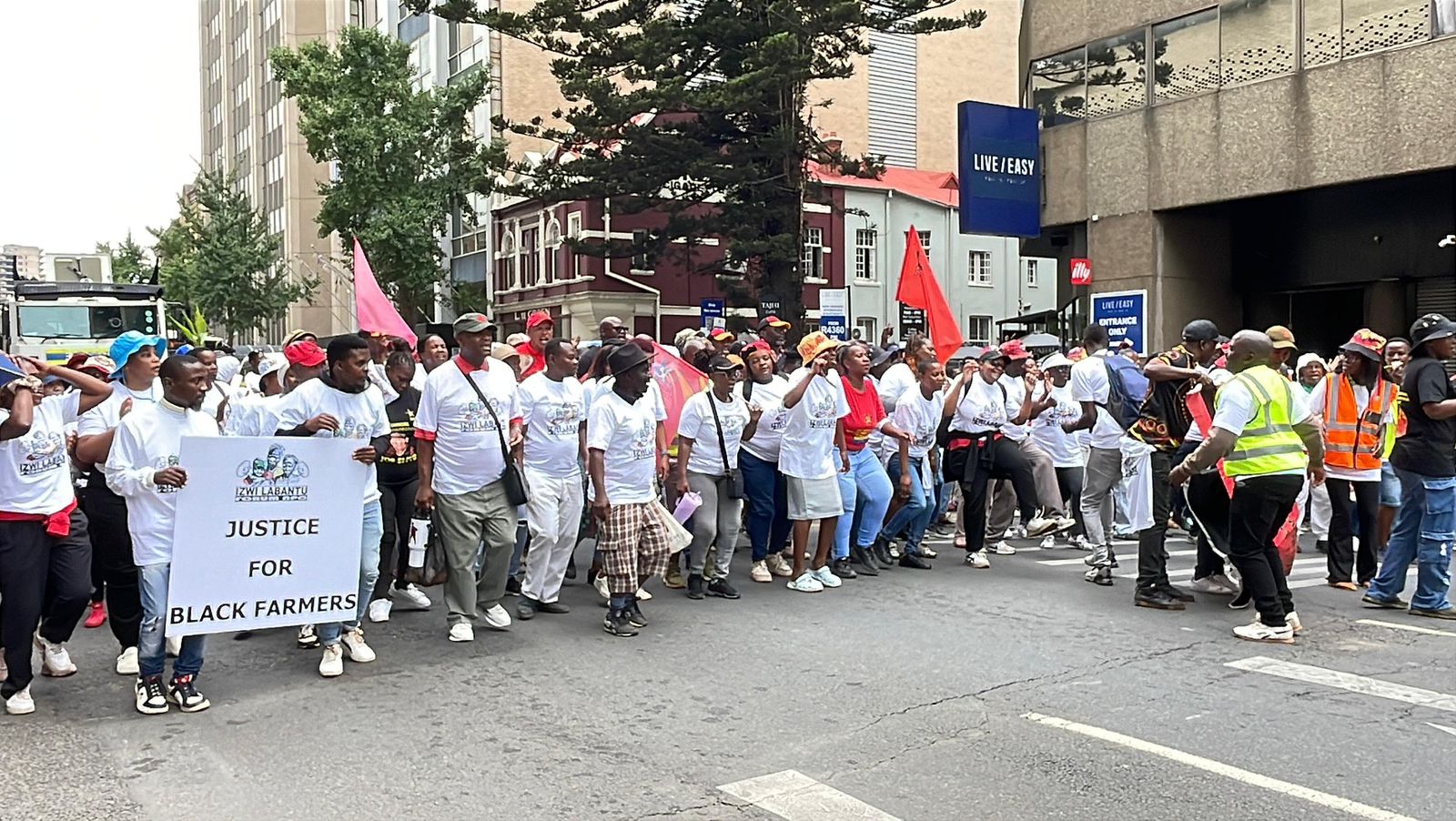 ILF SACP and black farmers alongside partners in the farming sector march to Union Buildings on Thursday to demand end of segregation and marginalisation of black farmers./ Izwi Labantu Forum