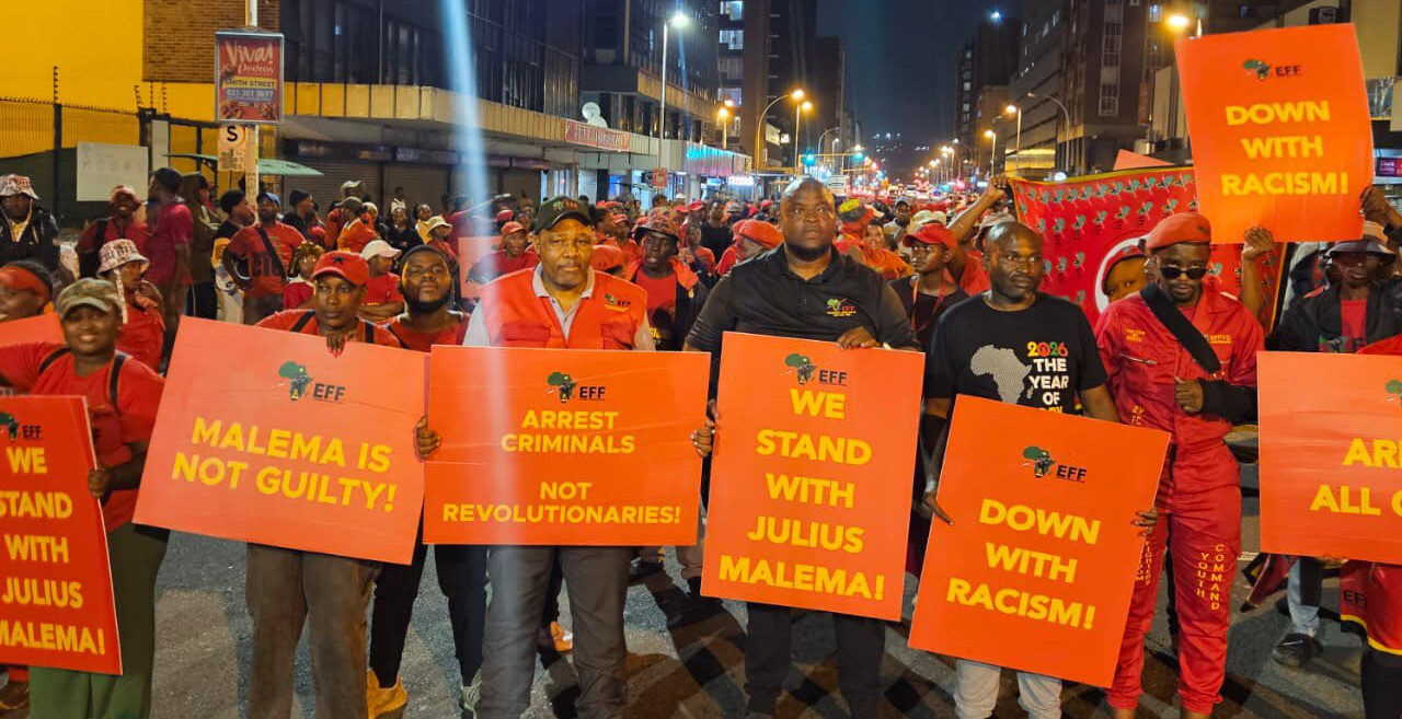 EFF supporters holding placards in support of Julius Malema