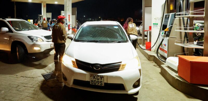 Motorists queue for fuel at a TotalEnergies petrol station