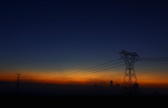 Eskom electricity pylons against a sky in Johannesburg, South Africa