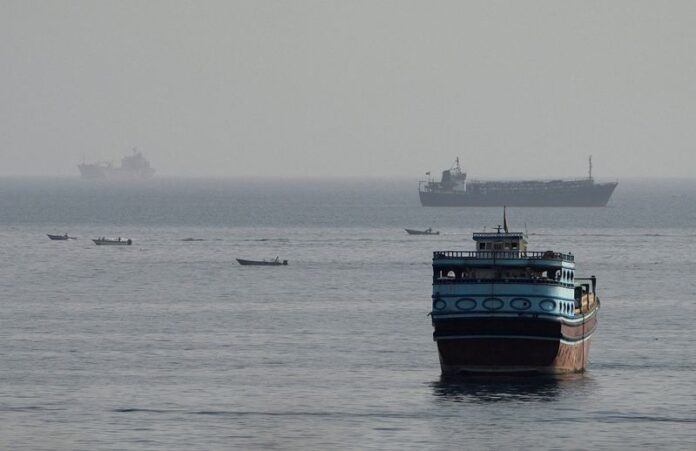 Vessels navigating the Strait of Hormuz, viewed from Musandam, Oman.
