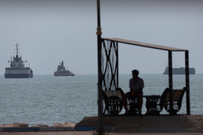 Vessels sailing near the beach of Bandar Abbas in the Strait of Hormuz, Iran.
