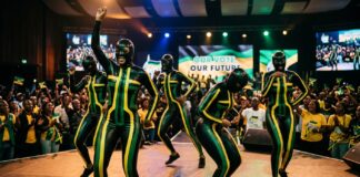 AI-generated image of dancers dressed in latex in ANC colours.