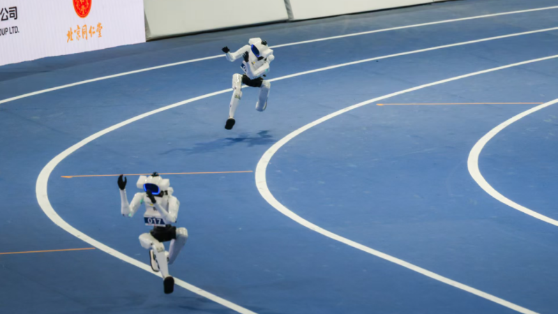 Tiangong Omni robot runs on the athletics track during the second World Humanoid Robot Games, the National Speed Skating Oval (the Ice Ribbon), Beijing, China. /CGTN