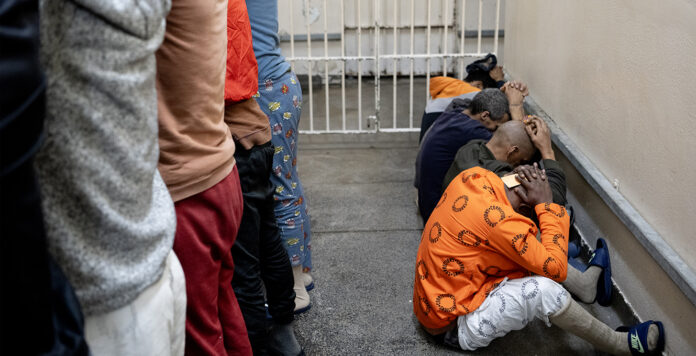 Prisoners awaiting trial outside their cells during a Department of Correctional Services inspection at Pollsmoor Prison