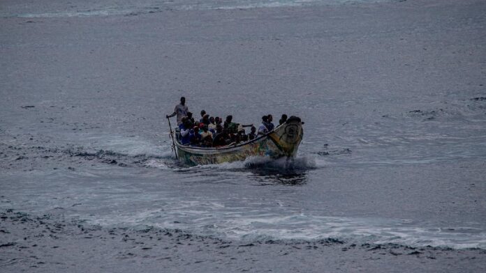 FILE: A wooden migrant boat carrying 65 people arrives at the port of La Restinga on the island of El Hierro, Canary Islands, Spain, October 24, 2025. /CFP