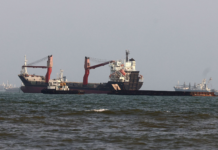 Oil slides as Iran peace talks ease supply fears strait