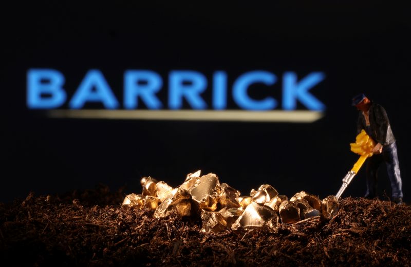 Barrick Mining reaches deal with Mali gold unions, averting strike A small toy figure and gold imitation in front of the Barrick logo