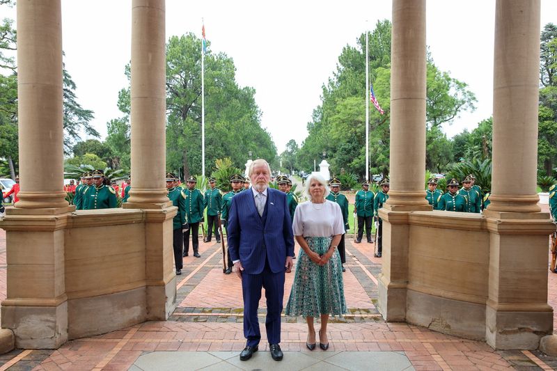 FILE PHOTO: U.S. Ambassador to South Africa Leo Brent Bozell III poses for a photograph with his wife Norma Petruccione Bozell ahead of a credentials ceremony for heads of mission‑designate at the Sefako Makgatho Presidential Guesthouse in Pretoria, South Africa, April 8, 2026. Jairus Mmutle/GCIS/Handout via REUTERS/ File Photo