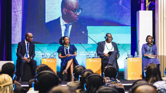 Delegates attending the Africa Food Systems Forum in Kigali, Rwanda, discussing agricultural transformation.