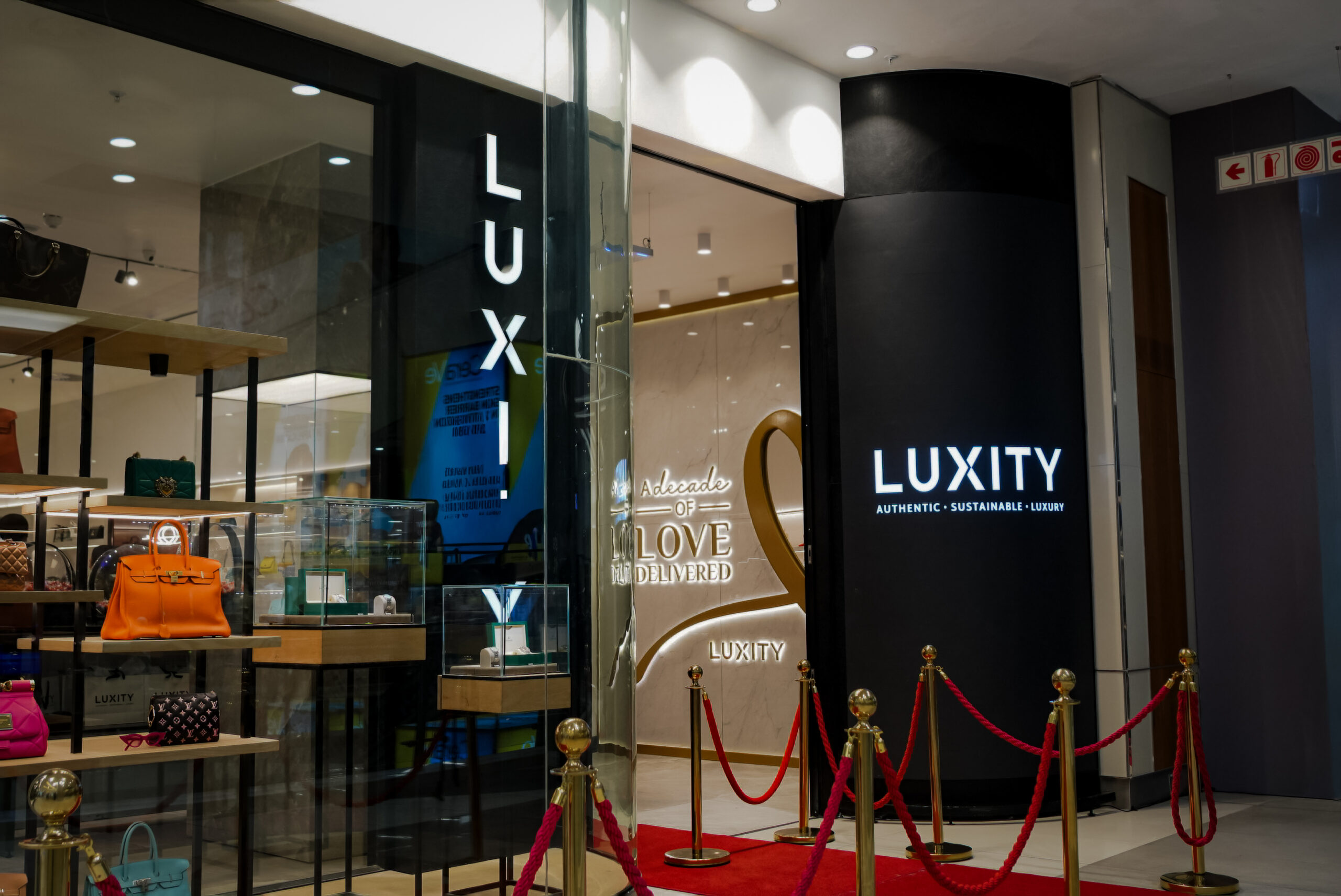 Selection of pre-owned luxury designer handbags and accessories representing the growth of South Africa’s luxury resale market