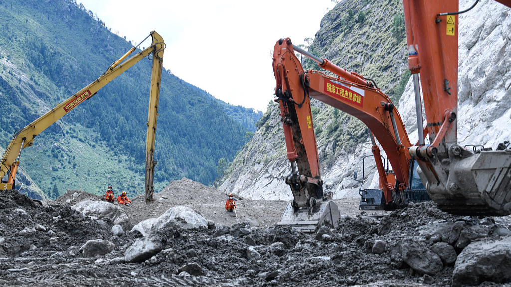 Heavy machinery operates in the hardest-hit area of Gyirong Port - southwest China's Xizang Autonomous Region.