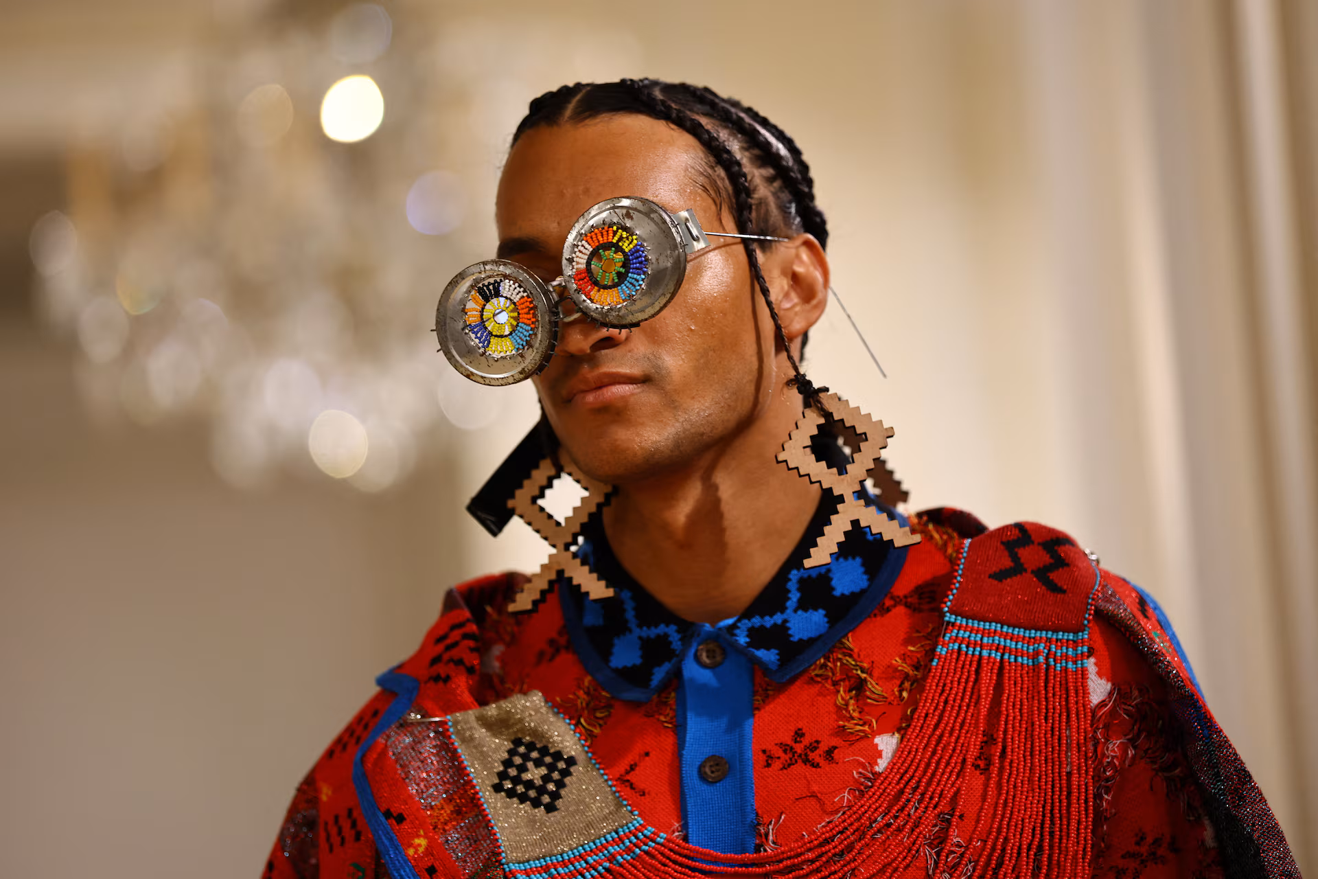 Maxhosa beaded sunglasses on model.