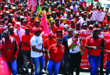 Cosatu’s old model meets a new world – and finds itself wanting COSATU members striking image