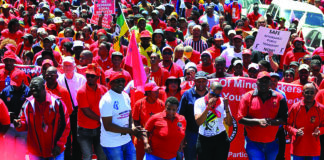 Cosatu’s old model meets a new world – and finds itself wanting COSATU members striking image