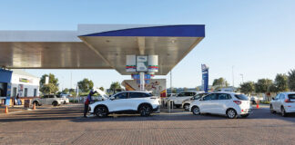 Motorists queuing at a Cape Town petrol station ahead of a major fuel price increase.