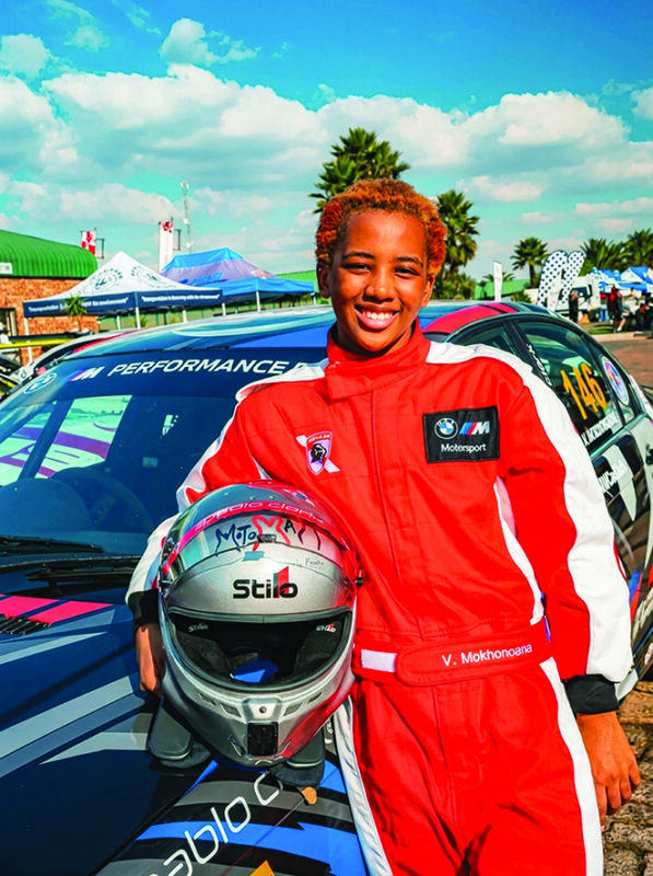 South African teenager Vatiswa Mokhonoana posing in her racing gear