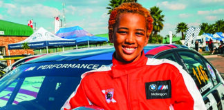 South African teenager Vatiswa Mokhonoana posing in her racing gear