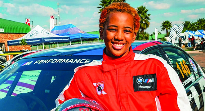 South African teenager Vatiswa Mokhonoana posing in her racing gear