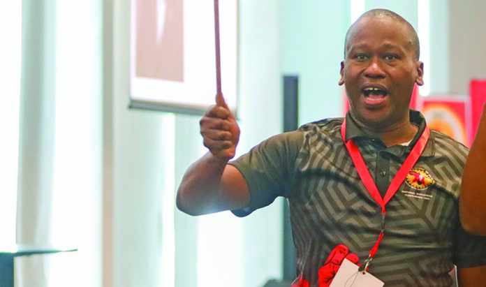 National Union of Metalworkers of South Africa members assembled at a conference