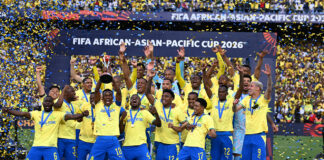 Mamelodi Sundowns players celebrate with the trophy at Loftus Versfeld Stadium after defeating Al Ahli