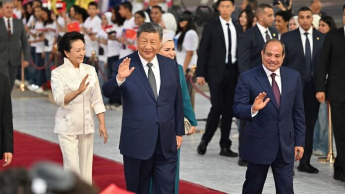 Chinese President Xi Jinping greeted by Egyptian President Abdel Fattah El-Sisi upon arrival in Cairo.