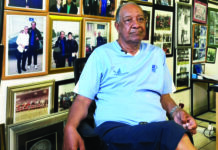 Palacios charts notable rise through legends, loss and lasting memories Augusto Palacios sitting in his home study surrounded by football trophies and memorabilia