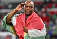 Pitso Mosimane starts new era on a high with impressive victory Pitso Mosimane with SA Flag