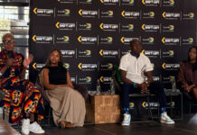 Alt text: Mashoto Mokgethi speaking about domestic tourism affordability at The Great Debate in Pretoria