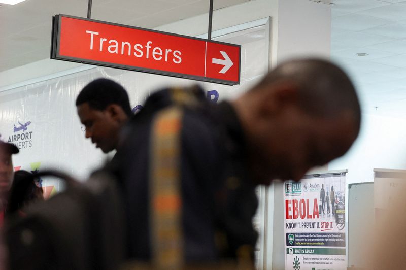 Travellers undergoing health screening at Murtala Muhammed International Airport in Lagos, Nigeria.